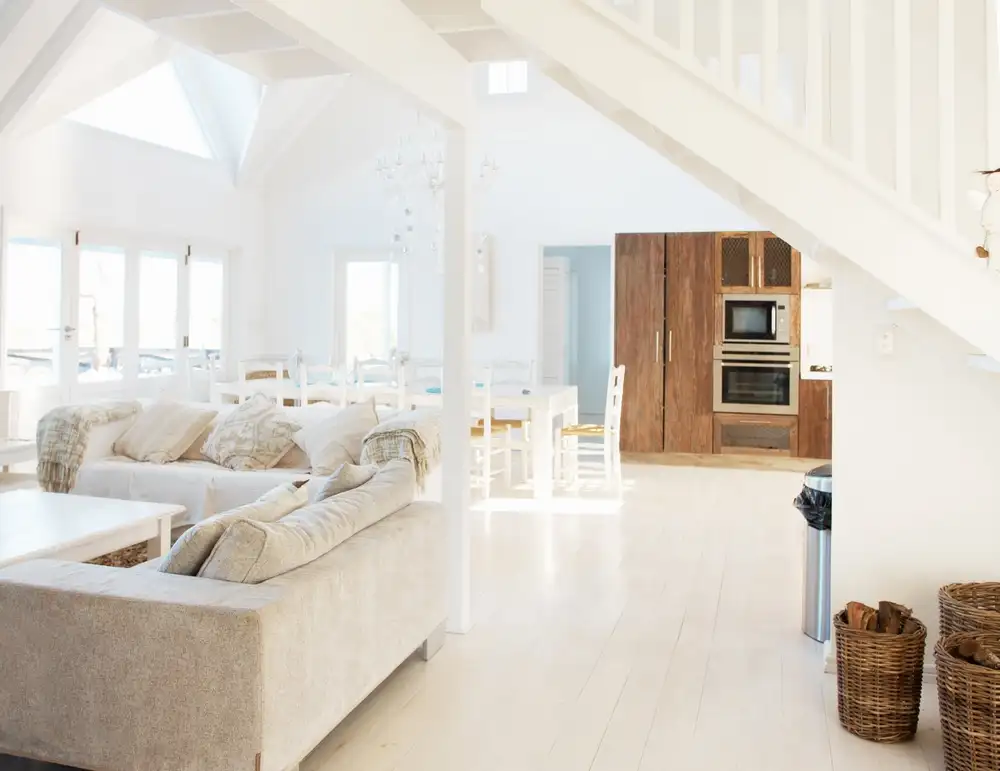 An extremely bright home ready for a real estate photoshoot.