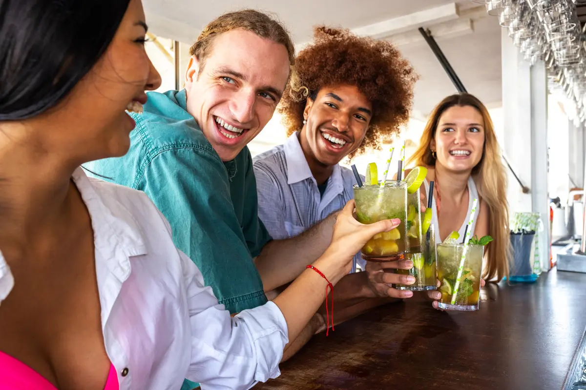 Coworkers enjoying happy hour in Naples and making friends.