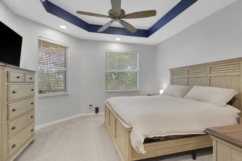 The master bedroom with king-sized bed at 1465 Mariposa Circle