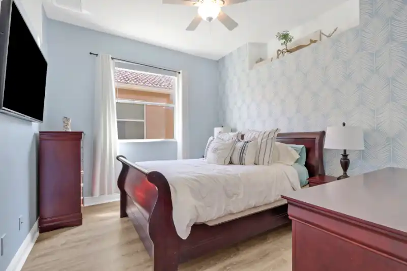 Guest bedroom wallpaper at 15464 Cortona Way