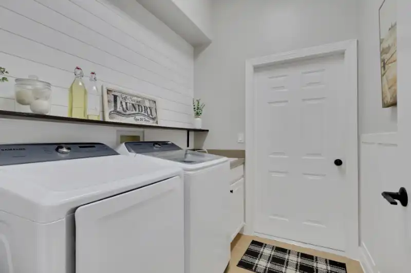 Laundry room shiplap and board and batten walls.