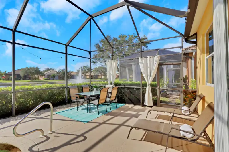 Dining area on the lanai of this single family Tuscany Cove home for sale