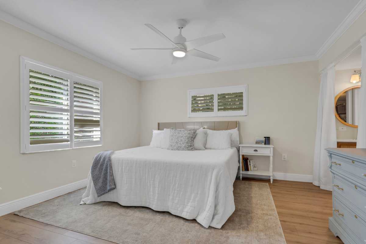 The master bedroom at 3031 Sandpiper Bay Circle #F106