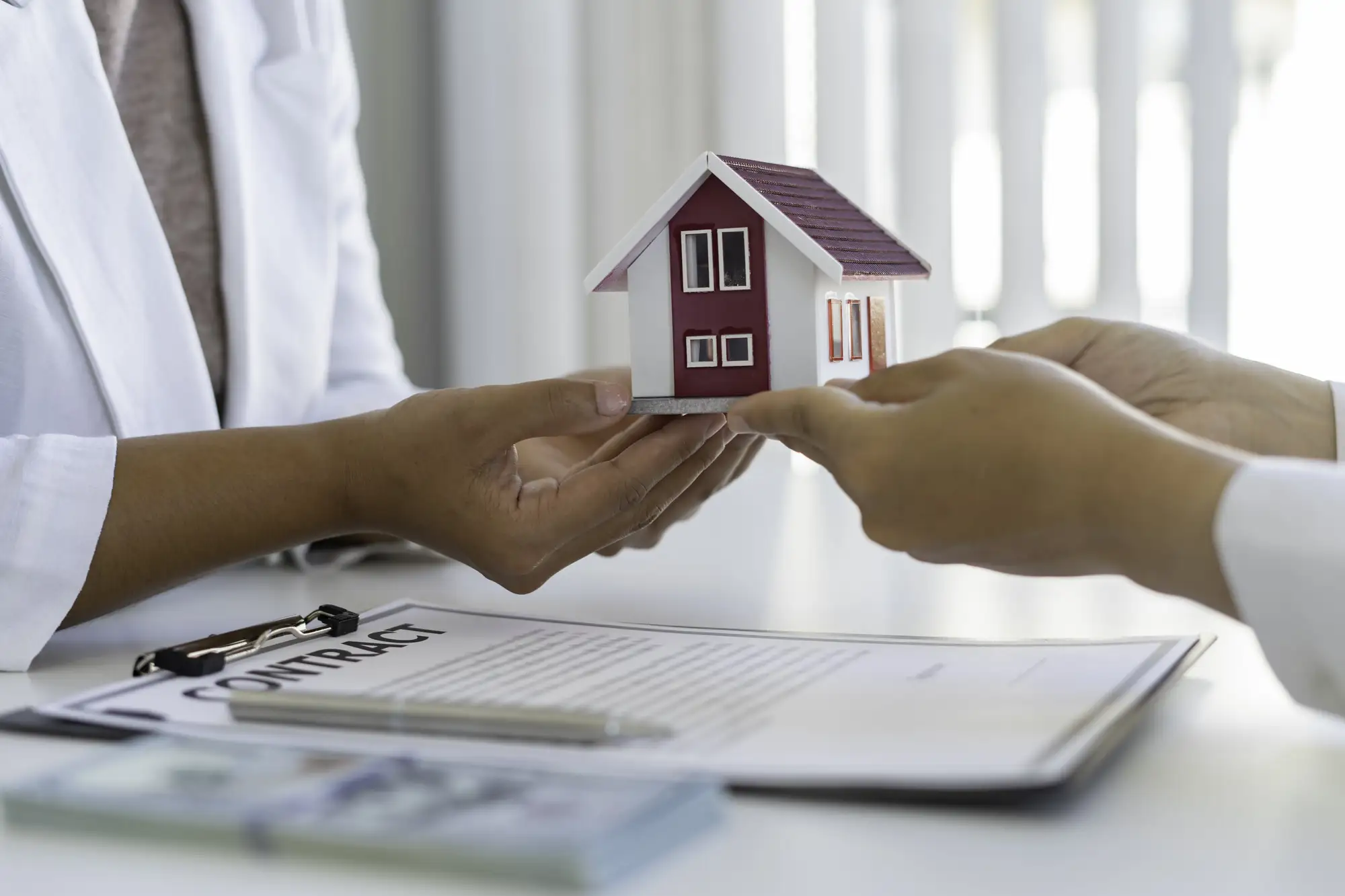 A Realtor selling a home to a buyer in Naples