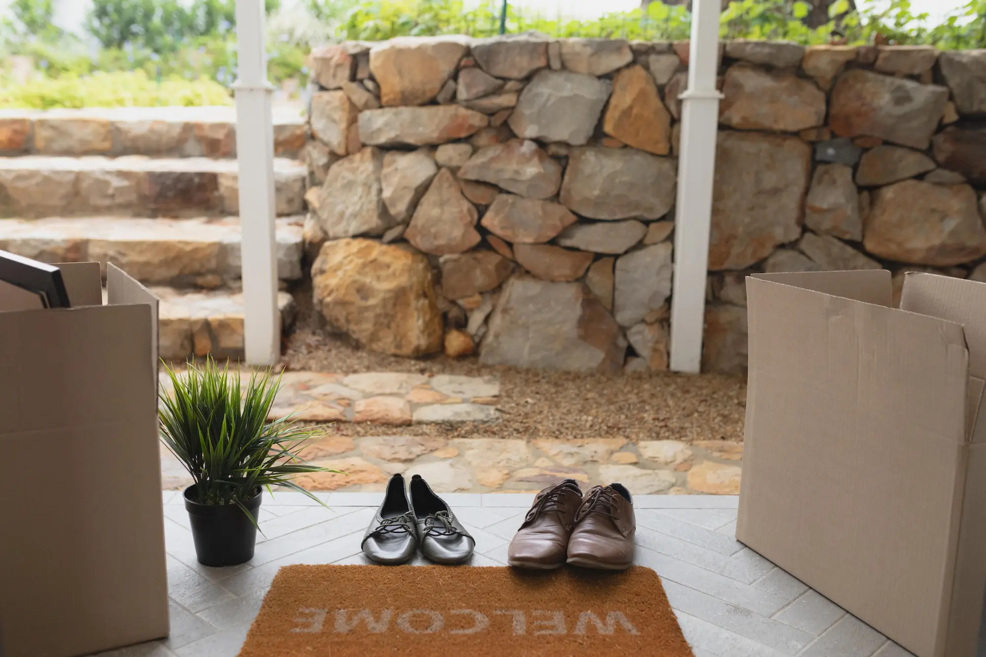 removing shoes outside as respect home tour etique in naples, florida